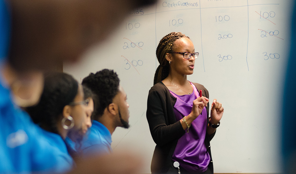 Pictured is a guest speaker at the ACAP summer program. Photo by Chris Rolinson.